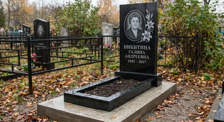 Памятник с гравировкой лилий — выполненная работа «Никитина» в Самаре